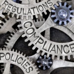Gears with words regulations, compliance and policies